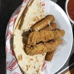 a chicken quesadilla and fries a chicken quesadilla and fries