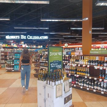 ABC Fine Wine & Spirits - a woman walking through a store - Beer, Wine & Spirits Near Me - Orlando, Florida ABC Fine Wine & Spirits - a woman walking through a store - Beer, Wine & Spirits Near Me - Orlando, Florida