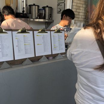 Cube Tea Studio - Cash register and menus; this is pretty much the entire shop. - Bubble Tea Near Me - St. Louis, Missouri