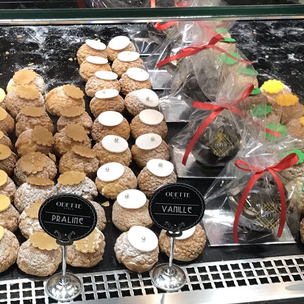 Odette - Display case of custard filled choux buns (profiteroles) - Tea Rooms Near Me - Paris, 75