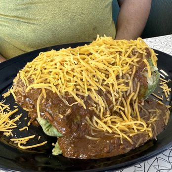Olivette Diner - Breakfast burrito topped with chili as our waitress recommended. - Diners Near Me - Saint Louis, Missouri
