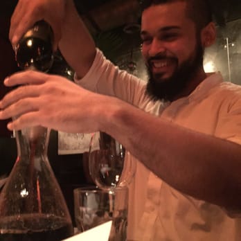 Barcelona Waypointe - Victor decanting our wine.  We were a bit ridiculous.  He was a good sport. - Wine Bars Near Me - Norwalk, Connecticut