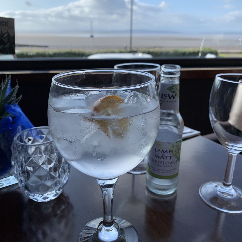 Aspect Bar & Bistro - Gin & elderberry tonic  with a view of the tide coming in. - Bistros Near Me - Morecambe, LAN