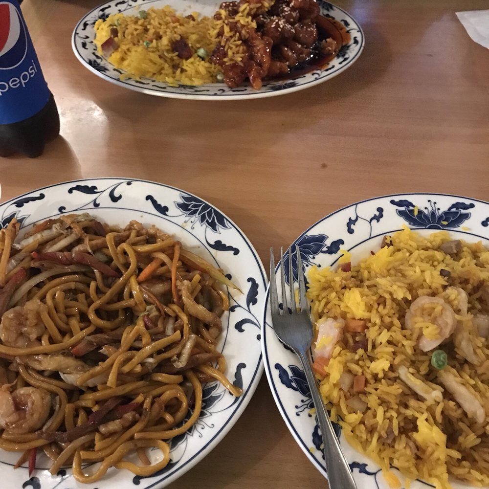 China King One - two plates of food on a table - Chinese Near Me - Carthage, New York China King One - two plates of food on a table - Chinese Near Me - Carthage, New York