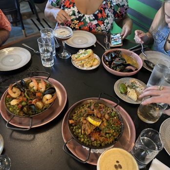 Cafe Americana - Seafood paella, spicy chicken paella, mussels, espresso martini (the brunette) - Tapas/Small Plates Near Me - Arlington, Texas