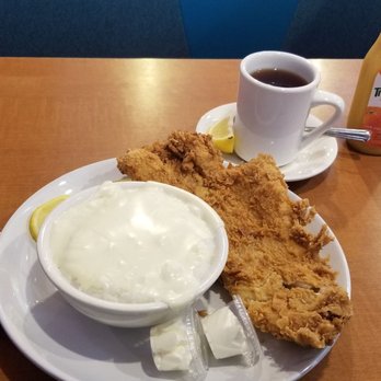 Quaker Diner - Cheese grits and fried cod Wheat toast, hot tea n OJ - Diners Near Me - Philadelphia, Pennsylvania