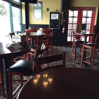 Fool & Flagon - tables and chairs in a restaurant - Pubs Near Me - Hamilton, Ontario