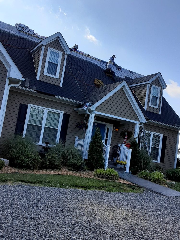 Slide of C & J Roofing