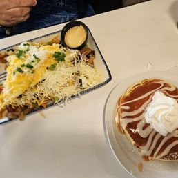 Loaded potatoes with side guava pancake. Loaded potatoes with side guava pancake.