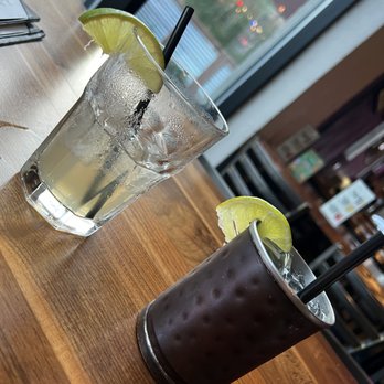 Tonic Court Ave - two drinks on a wooden table - Wine Bars Near Me - Des Moines, Iowa Tonic Court Ave - two drinks on a wooden table - Wine Bars Near Me - Des Moines, Iowa