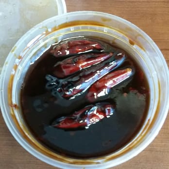 Hunan King Chinese Restaurant - Surprisingly delicious side of garlic sauce. - Chinese Near Me - Houston, Texas