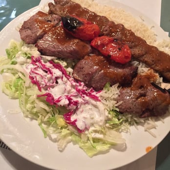 Zand's Persian Kebabs - Soltani (beef steak and lamb kubideh) with rice and salad yum! - Persian/Iranian Near Me - Bryan, Texas Zand's Persian Kebabs - Soltani (beef steak and lamb kubideh) with rice and salad yum! - Persian/Iranian Near Me - Bryan, Texas