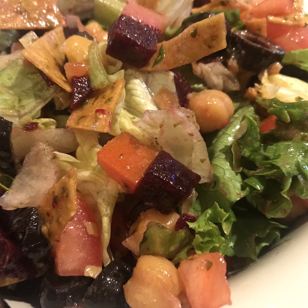 Stonefire Grill - Cartwheel side salad- Mixed greens, black olives, fresh beets, garbanzo beans, tomato, radishes, tortilla strips, and cilantro vinaigrette. - Salad Near Me - Torrance, California Stonefire Grill - Cartwheel side salad- Mixed greens, black olives, fresh beets, garbanzo beans, tomato, radishes, tortilla strips, and cilantro vinaigrette. - Salad Near Me - Torrance, California