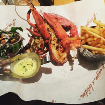 Burger & Lobster - The grilled lobster with chips, salad and a garlic butter sauce. - Seafood Near Me - London, XGL Burger & Lobster - The grilled lobster with chips, salad and a garlic butter sauce. - Seafood Near Me - London, XGL