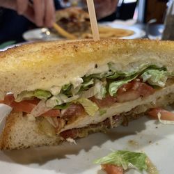 The Bus Stop Bar & Grille - Inside of Brad's chicken sandwich - I love how the chicken was pounded to an even thickness.