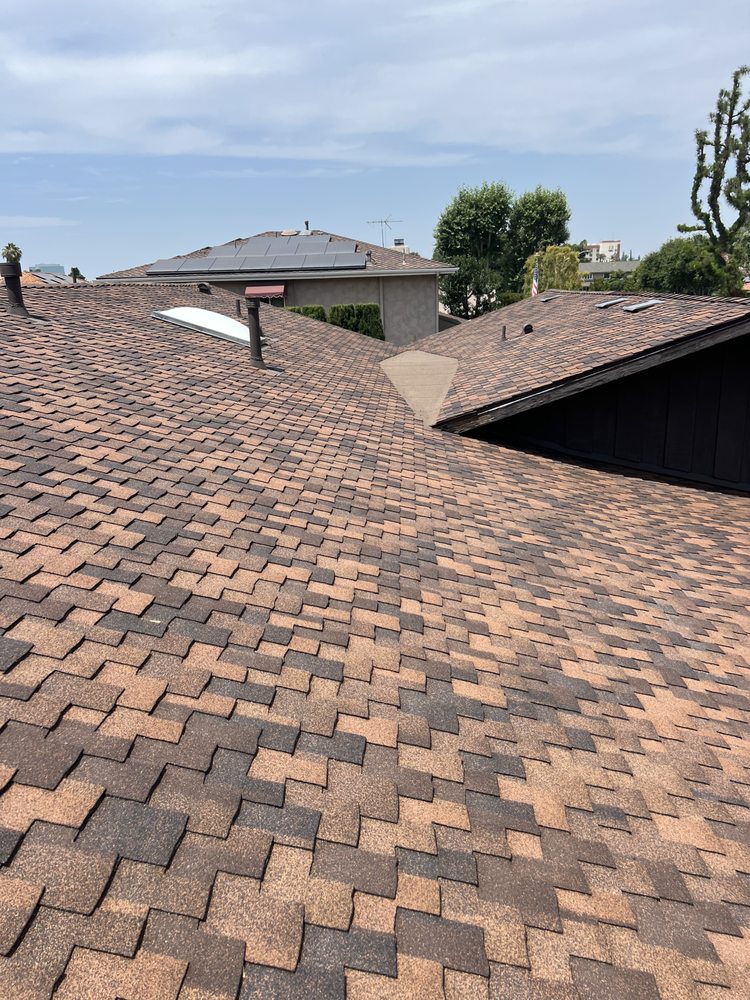 Slide of JVR Quality Roofing