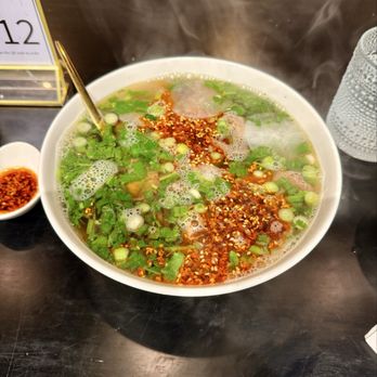 Kusan Bazaar | Silk Road Grill & Noodles 龟兹集市 - Beef noodles soup with a side of extra chili sauce - Halal Near Me - Mountain View, California Kusan Bazaar | Silk Road Grill & Noodles 龟兹集市 - Beef noodles soup with a side of extra chili sauce - Halal Near Me - Mountain View, California