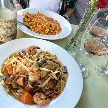 Sage Mediterranean Cuisine - two plates of pasta and a bottle of wine - Mediterranean Near Me - Phoenixville, Pennsylvania Sage Mediterranean Cuisine - two plates of pasta and a bottle of wine - Mediterranean Near Me - Phoenixville, Pennsylvania