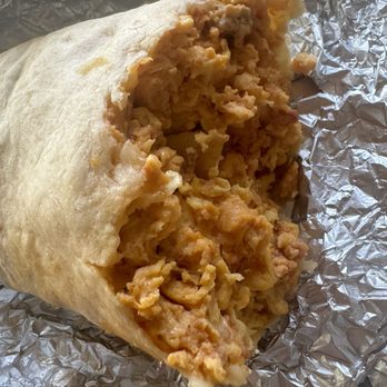 No Toro Cafe - Different pov of the sausage and chorizo less breakfast burrito that ordered and purchased. Gunner Breakfast Burrito - Breakfast & Brunch Near Me - Artesia, California