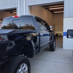 Tintology - Ford F-250 Platinum show truck getting limo tint all around.