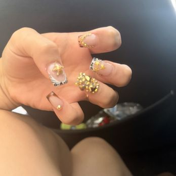 Daisy Nails - What i got. Unshaped Bumpy Mess. Big gems look hideous - Nail Salons Near Me - Minneapolis, Minnesota Daisy Nails - What i got. Unshaped Bumpy Mess. Big gems look hideous - Nail Salons Near Me - Minneapolis, Minnesota