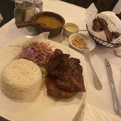 Don Alex - Pork chops/white rice/ onion salad/ beans/ Amarillo's.
