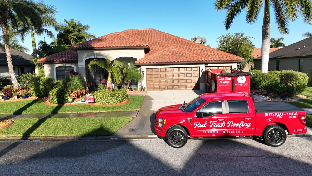 Slide of Red Truck Roofing
