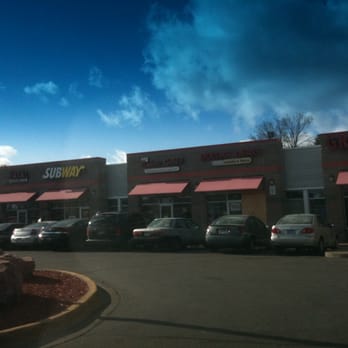 Daily Cairo Grill - cars parked in front of a restaurant - Middle Eastern Near Me - Minneapolis, Minnesota