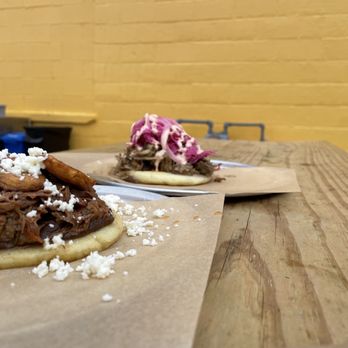 Little Chango - Ropa Vieja (left) and Pernil (right) arepas - Spanish Near Me - Asheville, North Carolina Little Chango - Ropa Vieja (left) and Pernil (right) arepas - Spanish Near Me - Asheville, North Carolina
