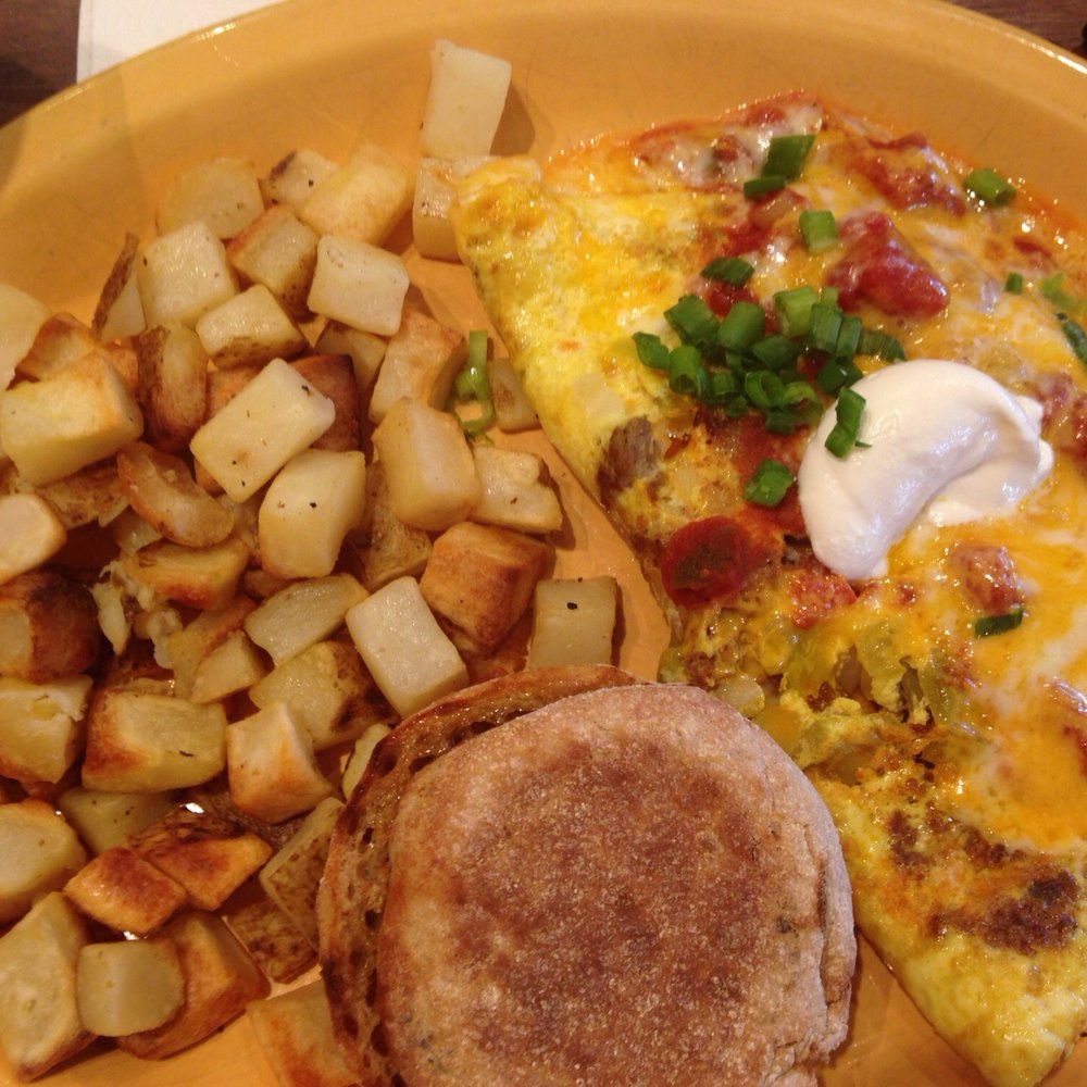 Scramblers - South of the Border omelette: four eggs, chorizo, salsa, sour cream. Slightly greasy but good. - Breakfast & Brunch Near Me - Strongsville, Ohio