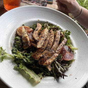 Waterfront Social - Caesar salad with blackened chicken - Bars Near Me - Crystal River, Florida
