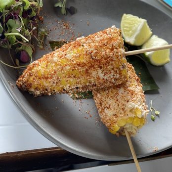 Spanglish NYC - Elote Al Grill Grilled Corn, Chipotle Mayo, Cotija Cheese, - Mexican Near Me - Bayside, New York Spanglish NYC - Elote Al Grill Grilled Corn, Chipotle Mayo, Cotija Cheese, - Mexican Near Me - Bayside, New York