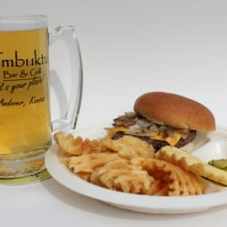 Timbuktu Bar & Grill - Add onion rings, curly fries, waffle fries, tator tots, or krinkel fries. Burger served with chips & and incl. local & state tax