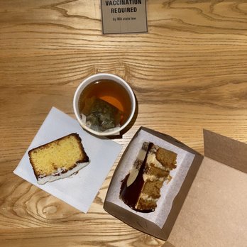 Sugar Bakery - Lemon polenta pound cake slice Crème brûlée cake slice 16oz white peach coconut tea - Coffee & Tea Near Me - Seattle, Washington Sugar Bakery - Lemon polenta pound cake slice Crème brûlée cake slice 16oz white peach coconut tea - Coffee & Tea Near Me - Seattle, Washington