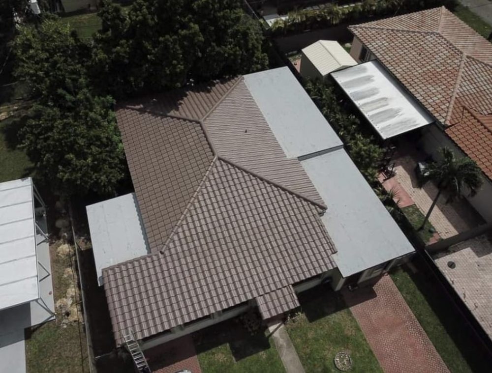 Slide of RMS Roofing Group