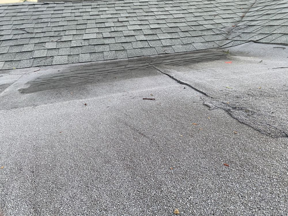 Slide of Total Roofing Contractors