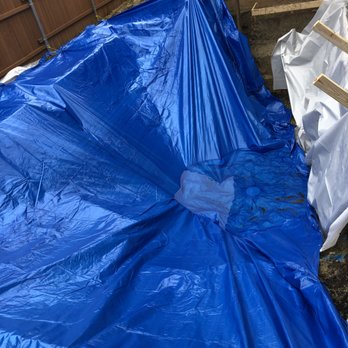 Alterra Landscape Design - a blue tarp covering a house - Landscape Architects or Designers Near Me Alterra Landscape Design - a blue tarp covering a house - Landscape Architects or Designers Near Me