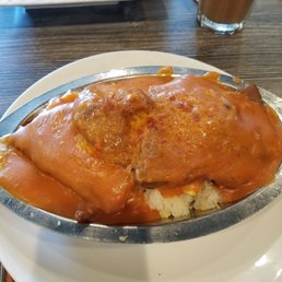 Baked pork chop rice. Comes with a drink for $8.50 lunch special.