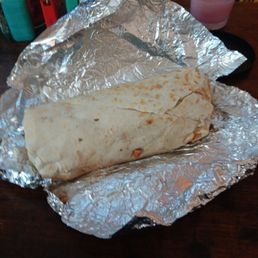 This the burrito I got that had a roach in it.how does a place like this stay n business This the burrito I got that had a roach in it.how does a place like this stay n business