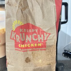 The Bagel Barn - LOL at the bag. Just go across the street to the dollar general and get plain brown bags.