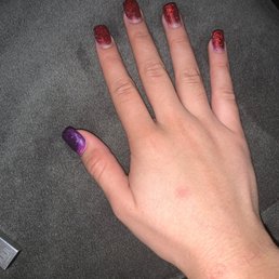 This is the hand when she started doing my nails and midway stopped and tried to make me pay in the middle of getting them done.