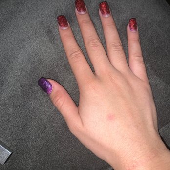 Beautiful Nails - This is the hand when she started doing my nails and midway stopped and tried to make me pay in the middle of getting them done. - Nail Salons Near Me - Houston, Texas