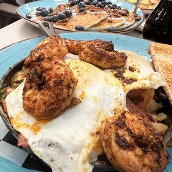 Amy's Omelette House - Nashville skillet - blackened shrimp, turkey bacon, potatoes, cheddar cheese, and roasted tomatoes with over easy eggs. Highly recommended! - Breakfast & Brunch Near Me - Long Branch, New Jersey Amy's Omelette House - Nashville skillet - blackened shrimp, turkey bacon, potatoes, cheddar cheese, and roasted tomatoes with over easy eggs. Highly recommended! - Breakfast & Brunch Near Me - Long Branch, New Jersey