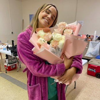 Happiness Flowers - Actress Bailee Madison loving her bouquet. - Floral Designers Near Me Happiness Flowers - Actress Bailee Madison loving her bouquet. - Floral Designers Near Me