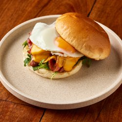 Paradox Coffee Roasters - Bacon Egg Roll Rocket, bacon, egg, American cheese, BBQ sauce on milk bun