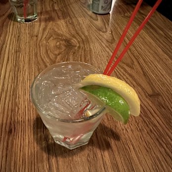 Lucky Boys - a drink with a lime wedge in a glass - Dive Bars Near Me - Kansas City, Missouri Lucky Boys - a drink with a lime wedge in a glass - Dive Bars Near Me - Kansas City, Missouri
