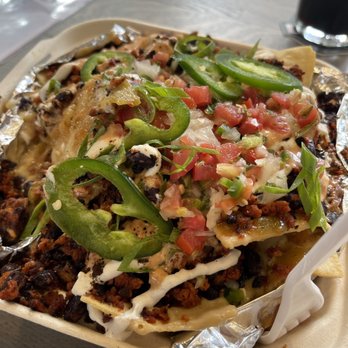 Danico Brewing Company - Loaded nachos with soyrizo and cashew cheeze and other goodies!  Huge portion and oh so delicious! From The Savage Beet food truck. - Breweries Near Me - Denver, Colorado
