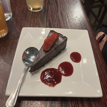 Sedona Taphouse - Chocolate Decadence Flourless Cake with the best Raspberry Coulée!! - American Near Me - Norwalk, Connecticut Sedona Taphouse - Chocolate Decadence Flourless Cake with the best Raspberry Coulée!! - American Near Me - Norwalk, Connecticut