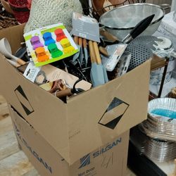 HomeGoods - Cardboard boxes full of stuff on the floor