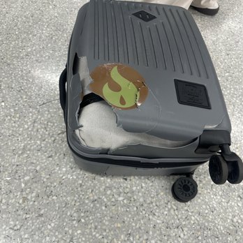 Hawaiian Airlines - Smashed suitcase - Airlines Near Me - Oakland, California